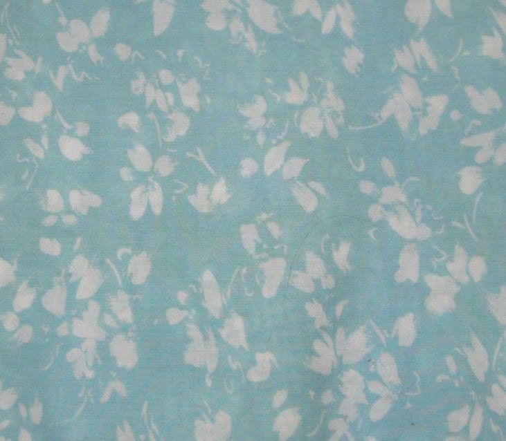 flower backgrounds for tumblr. It's a light turquoise blue in the background, with a floral white design.