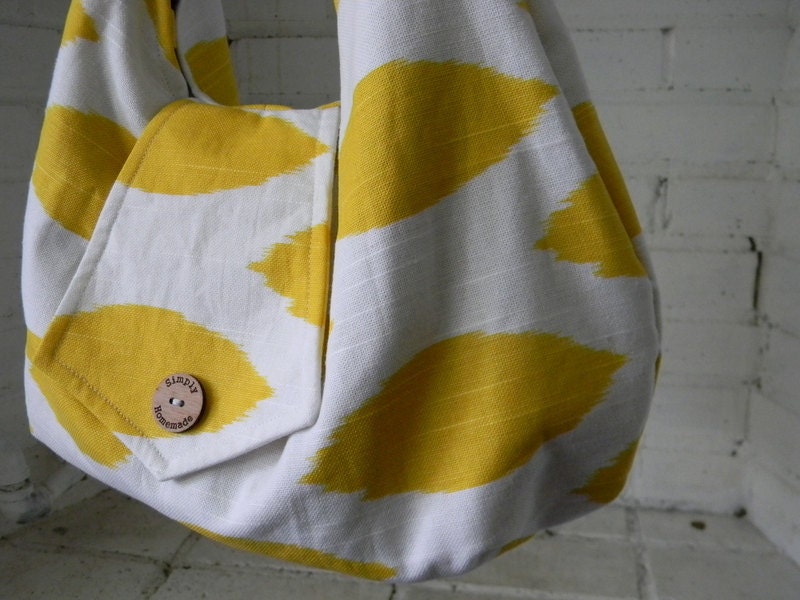 Large slouchy yellow and white purse