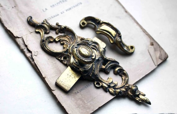 French latch key - fancy brass bolt slide lock - ornate rococo golden door latch