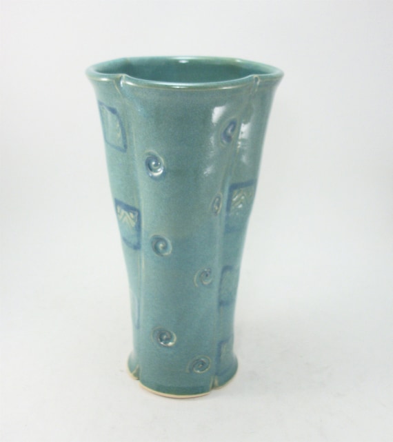 tall skinny turquoise or teal vase