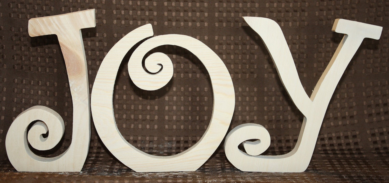 Joy unfinished wood word to decorate you home for the season  6" tall