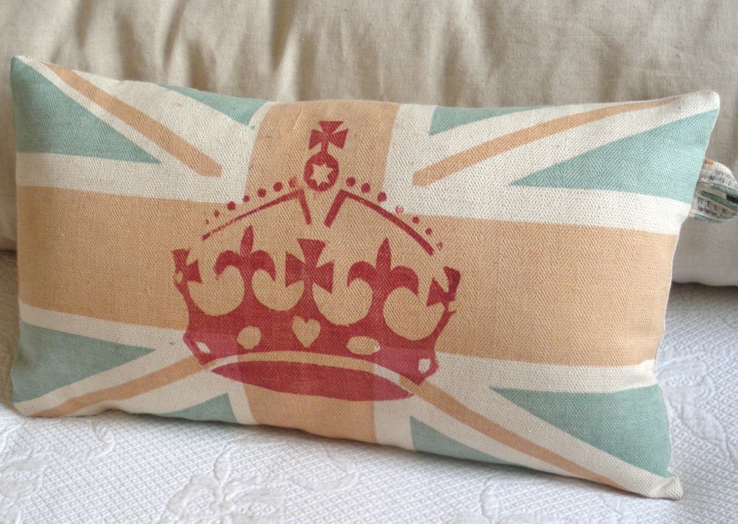 hand printed  muted brown union jack flag  crown  cushion