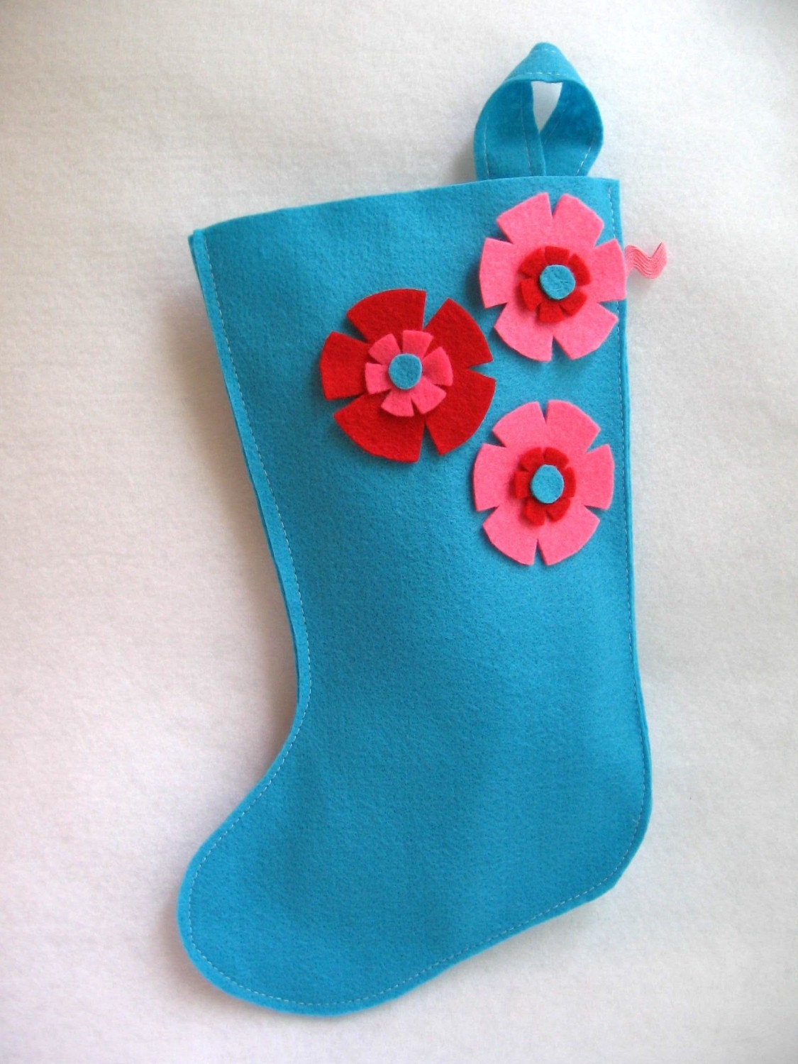 eco deal...rikrak Christmas...turquoise, pink and red felt stocking
